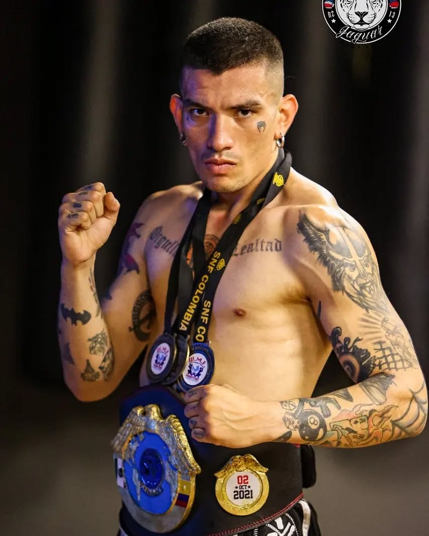 Champion fighter with belts